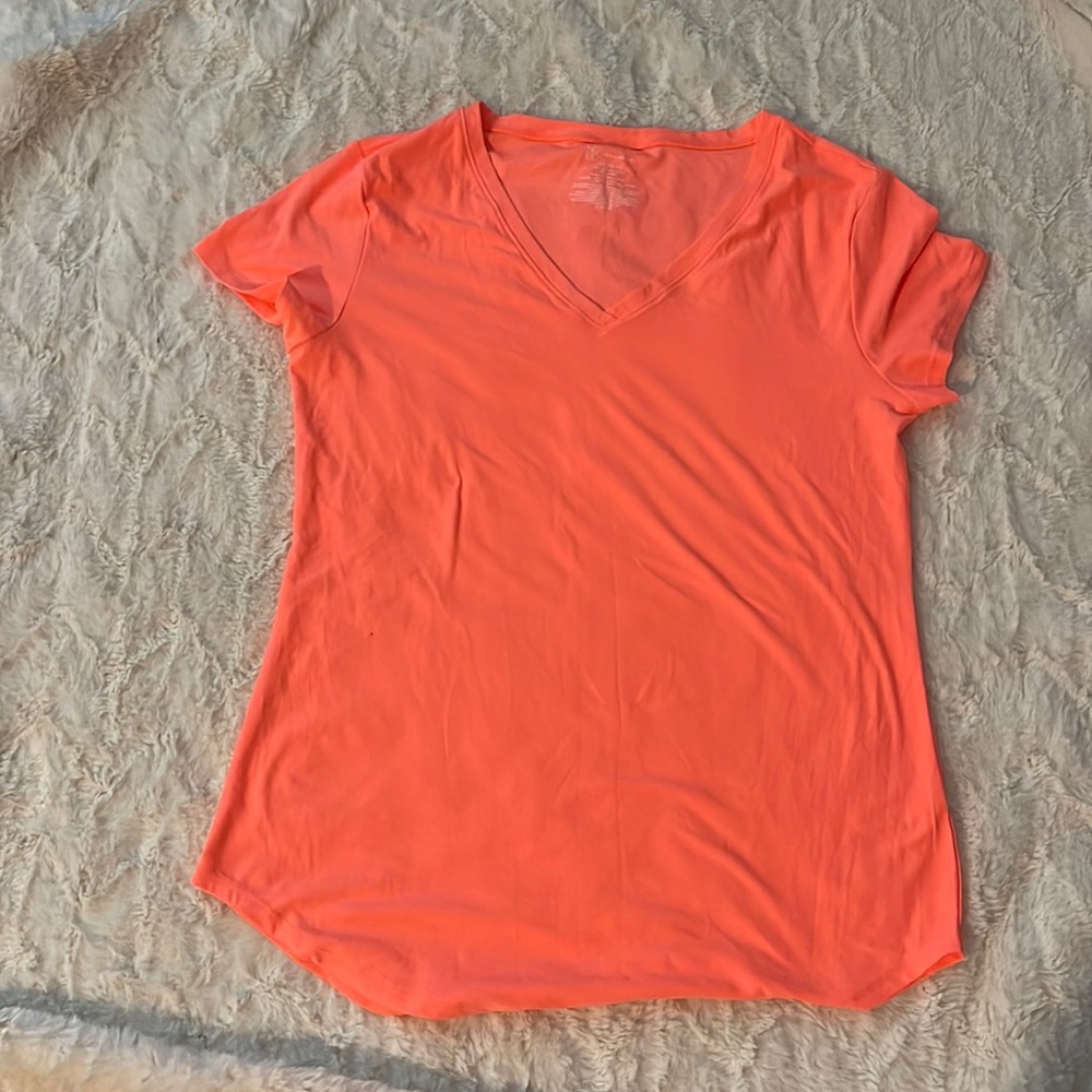 No Boundaries neon coral colored stretchy top
